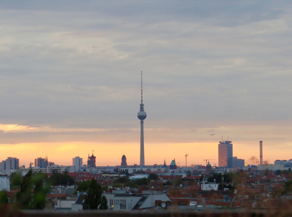 Sunset over Berlin from KlunkerKranich, an alternative rooftop bar.